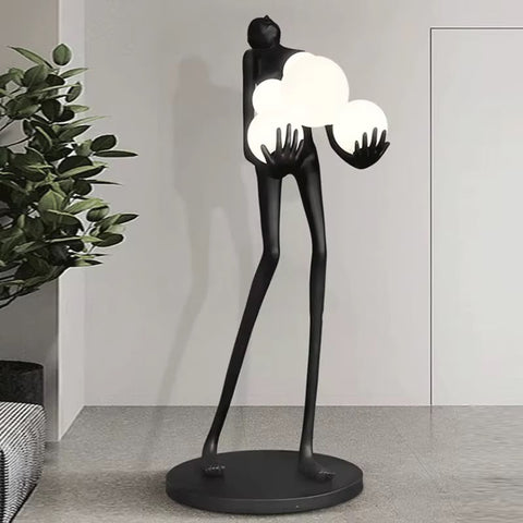Modern Artistic Figurine LED Floor Lamp with Glowing Orb Lights